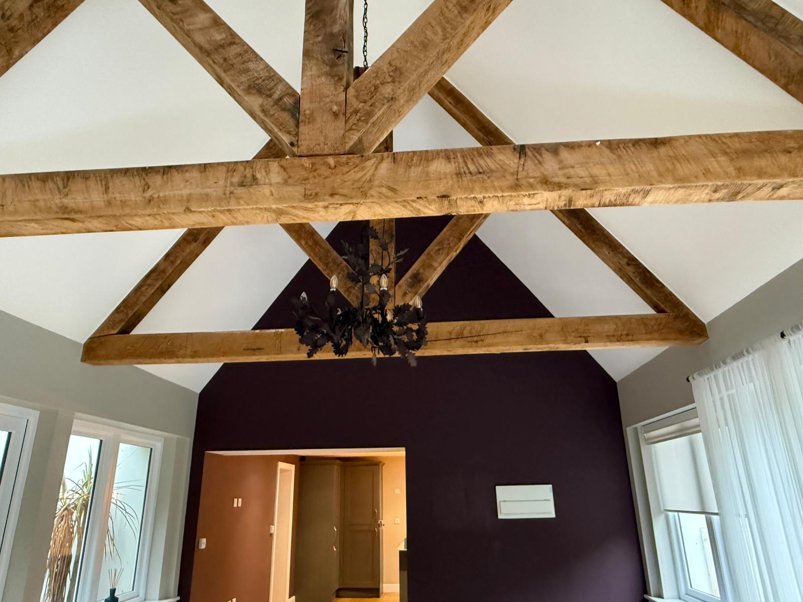 Vaulted ceiling with plum feature wall